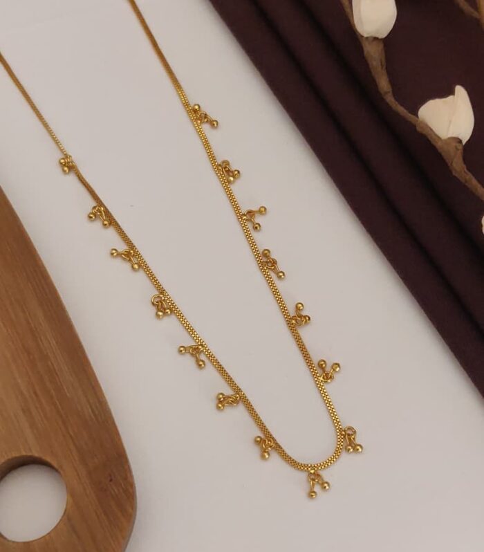 Golden Touch Jewel | The Gilded Chime Necklace
